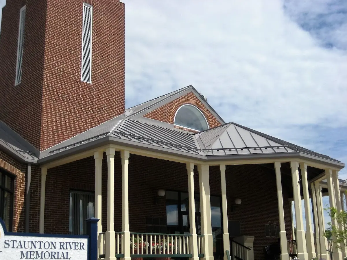 Skilled roofing craftsmen working on a residential roof in Sumterville